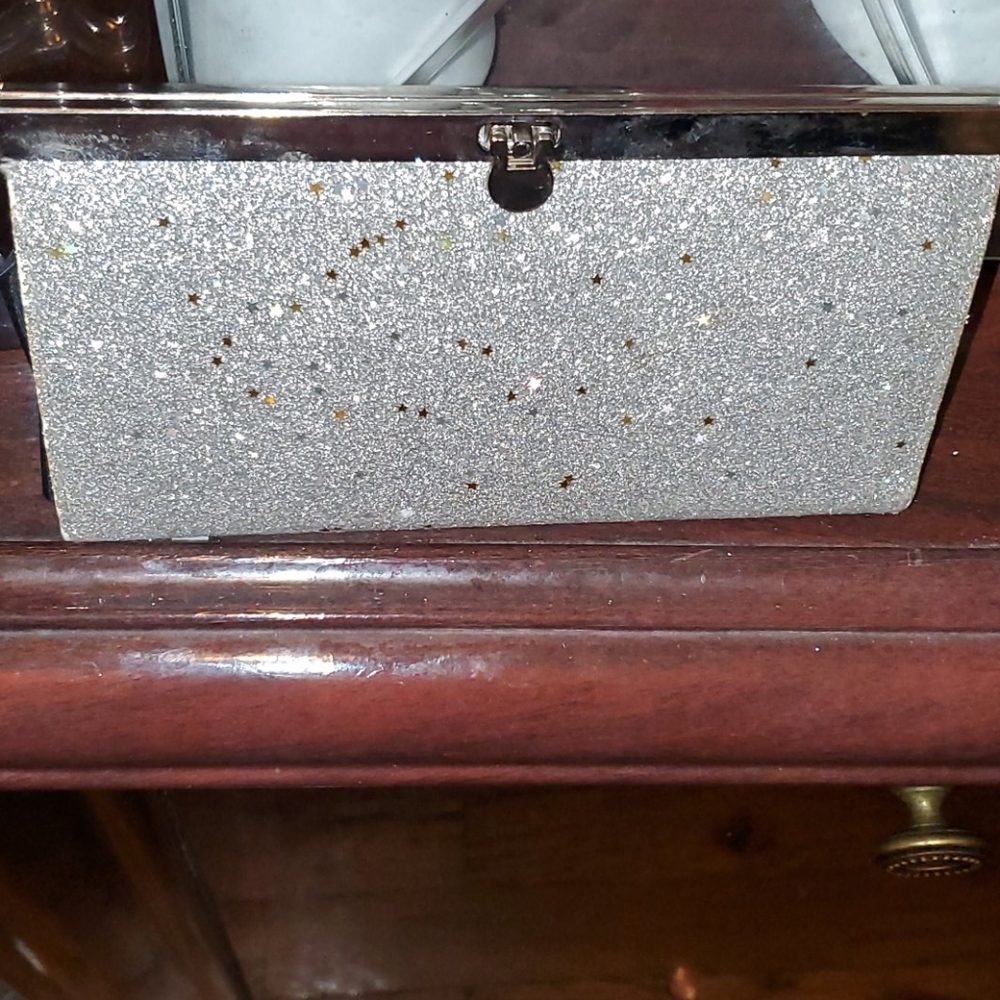 Silver clutch